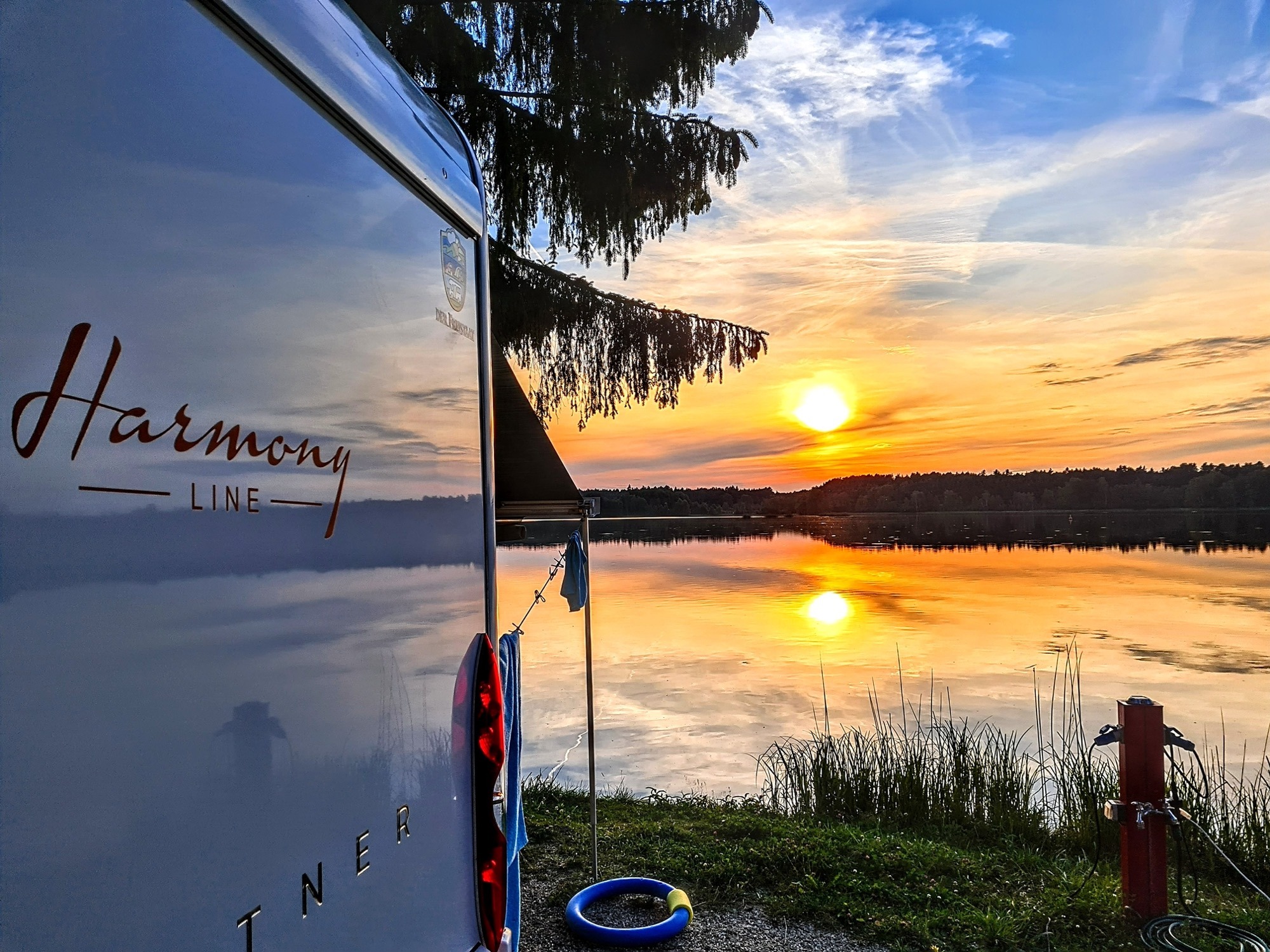 Camper bei Sonnenuntergang am See - Camping in Bayern am See